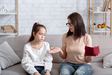 Family financial problems during coronavirus pandemic. Unhappy mother and her daughter with empty...