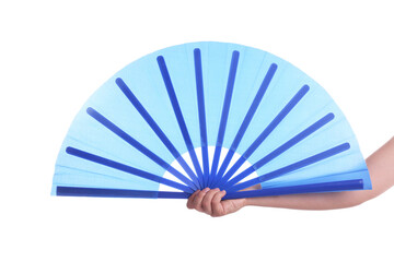 Woman holding blue hand fan on white background, closeup