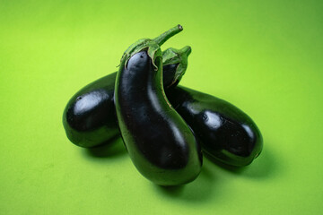 bright eggplant on green background