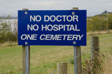 Sign to alert the driver to slow down. Waihola. Otago. South Island. New Zealand.