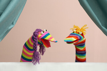 Creative puppet show on white stage indoors - obrazy, fototapety, plakaty