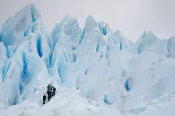 group of tourists hiking on the Perito Moreno glacier