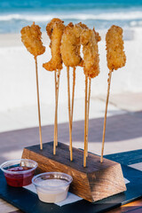 Typical spanish food called Caballitos with frybread prawns in La Manga del Mar Menor, Murcia, Spain