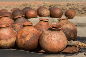 Some clay pots for storing date palm syrup.