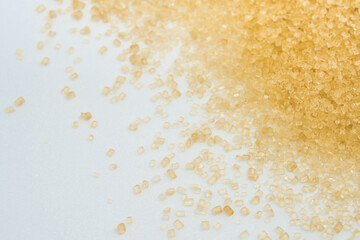 Brown sugar and copy space on a white background