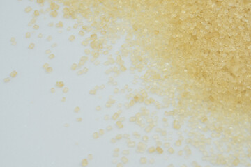 Brown sugar and copy space on a white background