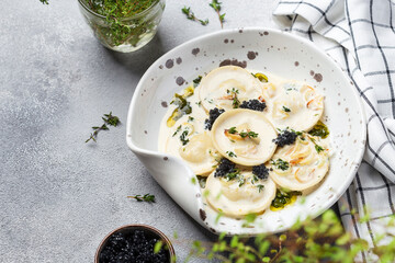 ravioli with mushroom, cream sauce and cheese