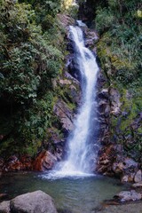 Obraz premium Landscape with amazing waterfall between stone