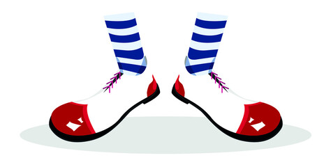 clown white shoes with a red toe. striped socks.isolated image of clown shoes.