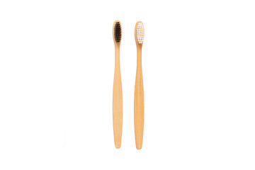 Natural bamboo toothbrushes on a white isolated background. Oral care and dental health. The concept of a future without plastic waste. Zero waste concept. Copy space. view from above
