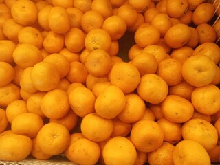 Closeup fresh mandarin orange at the supermarket