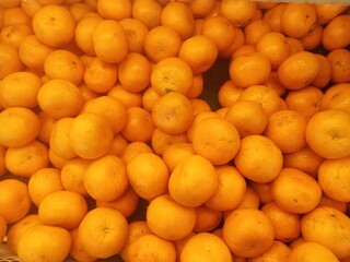Closeup fresh mandarin orange at the supermarket