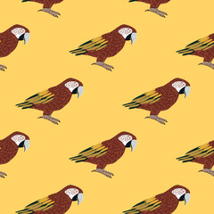 Brown colored doodle parrot ara bird seamless pattern. Exotic animal backdrop. Light yellow background.