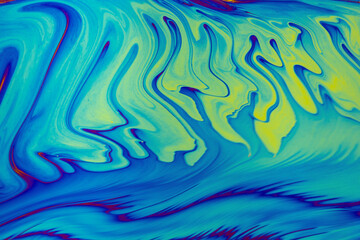 Psychedelic multicolored patterns background. Photo macro shot of soap bubbles.