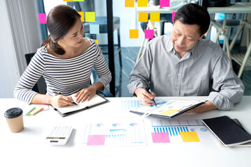 Business men and women are having a business plan consultation meeting