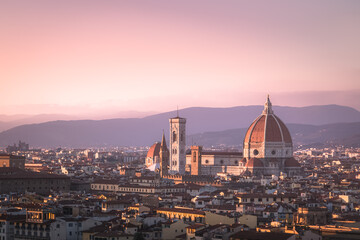 Fototapeta na wymiar A sunset view of old town Florence cityscape skyline, and Cathedral of Santa Maria del Fiore (il duomo) from Piazzale Michelangelo.
