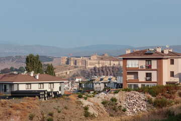 View of Ayasuluk Hill & Selcuk Castle through the homes of Selcuk