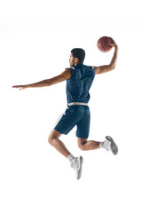 High flight. Young arabian muscular basketball player in action, motion isolated on white...