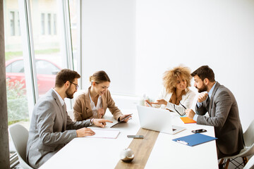 Multiethnic young business people working together in the office