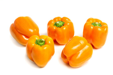 sweet Bulgarian yellow pepper on a white background with a shadow