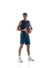 Achievements. Young arabian muscular basketball player posing confident isolated on white background. Concept of sport, movement, energy and dynamic, healthy lifestyle. Training, practicing.