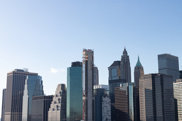 Fototapeta na wymiar Office Skyscrapers in the Lower Manhattan Skyline of New York City with a Clear Blue Sky