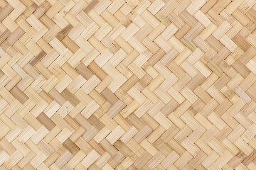 Traditional bamboo handcraft weaving pattern in Thailand. Thai wicker rattan texture pattern. Local handmade.