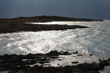 waves crashing on rocks