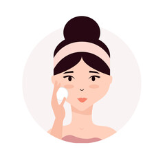 Woman taking care of her face. Daily skincare routine. Young woman applying facial lotion to her face with cotton pad. Skin hydration, moisturizing
