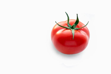 One red tomato isolated on white background with soft shadow