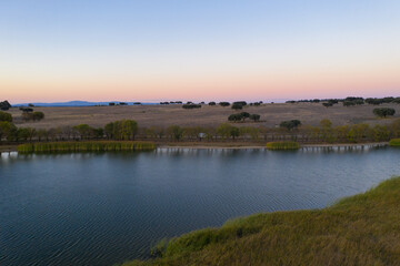 Lake drone aerial view at sunset in Alentejo, Portugal