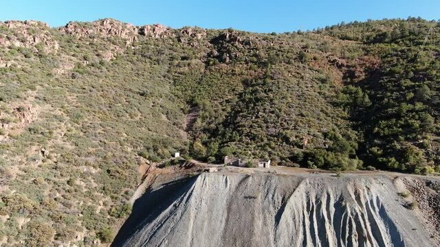 Aerial footage over an old, long since abandoned copper mine, just above Jerome, Arizona. Footage was shot in late September along Highway 89A in north-central Arizona.