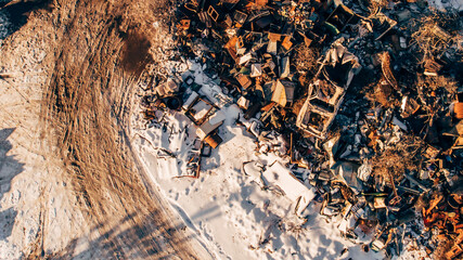 Aerial photograph of the metal dump. The iron of the iron lies on the heap.