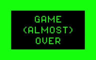 A message on a computer screen: game (almost) over. 8-bit retro font, green text on a black background.
