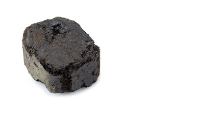 Coal fuel briquette isolated on white background.