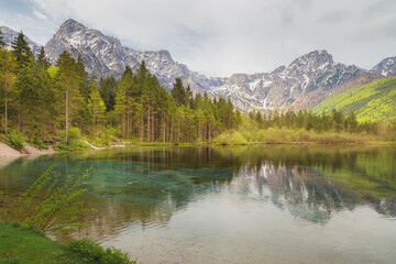 A calm day at Lake Almsee in Upper Austria's part of the Salzkammergut in the Almtal valley.