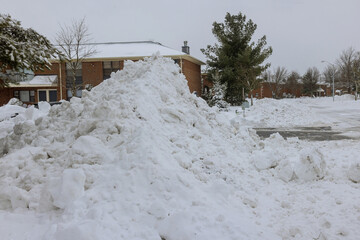 A pile of snow with removed beside of snow after a very heavy snowfall