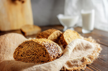 grain bread on the table. dairy products