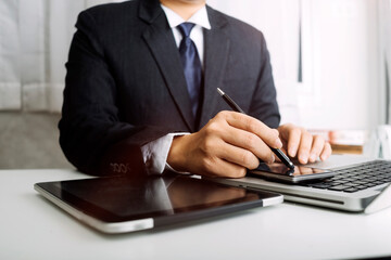 Searching Browsing Internet Data Information with blank search bar.businessman working with smart phone, tablet and laptop computer on desk in office. Networking Concept