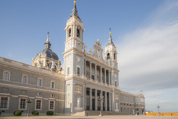 Fototapeta na wymiar The Almudena Cathedral outside the entrance to the Royal Palace, is the seat of the Roman Catholic Archdiocese of Madrid in Spain