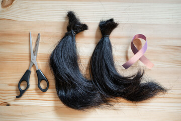 Locks of hair for donation for cancer patient to make a wig