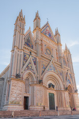 The spectacular 14th century facade of the Roman Catholic Duomo di Orvieto in the hilltop Umbrian...