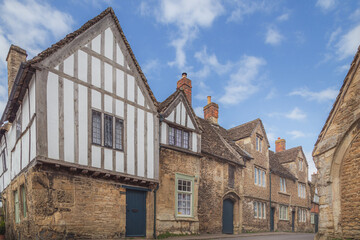 The historic and well preserved village of Lacock, in county Wiltshire, England is popular tourist stop.