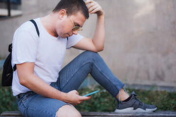Man using smart phone connect communication. Young people addiction to new technology trends. Youth, new generation internet friendship concept. Emotional isolation and depresion