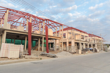 Obraz premium construction residential new house in progress at building site