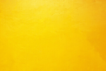 Yellow concrete wall texture background