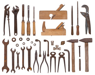 Collection of vintage tools such as wrenches, hammer, chisels and other isolated on white...