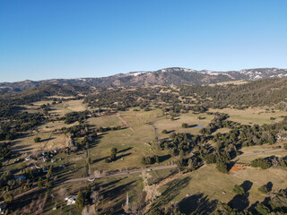 Aerial view of valley with farmland an forest in Julian, San Diego County, California, in the United States