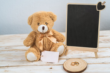 Valentines day teddy bear on white table and white background