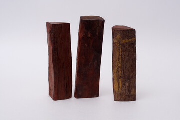 Sandalwood logs on white background
